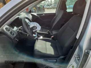 2012 Volkswagen Tiguan S с VIN WVGAV7AXXCW606008, выставлен на аукционе Copart как лот 62232655 с пробегом 184 316 миль миль и Списание • Salvage title. История ставок и продаж доступна на DreamBid. Изображение 7.