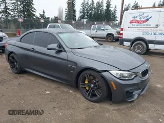 2015 BMW M4 z VIN WBS3U9C58FP967414, wystawiony jako IAAI lot #41890511 z przebiegiem 56 710 mil mil oraz . Historia ofert i sprzedaży dostępna na DreamBid. Obrazek 1.