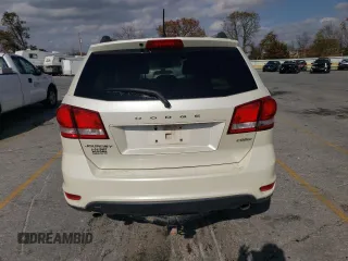 2012 Dodge Journey SXT с VIN 3C4PDCCG7CT211927, выставлен на аукционе Copart как лот 77769624 с пробегом 136 819 миль миль и Списание • Salvage title. История ставок и продаж доступна на DreamBid. Изображение 6.