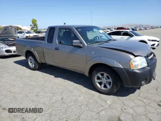 2004 Nissan Frontier XE with VIN 1N6DD26T14C412707, listed as a Copart auction lot 56789905 with 288,721 mi miles and Salvage title. Bid and sale history available at DreamBid. Image 4.