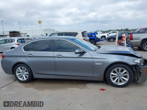 2014 BMW 5 Series 528i with VIN WBA5A5C52ED500696, listed as a IAAI auction lot 41708462 with 121,592 mi miles. Bid and sale history available at carsss.com. Image 13.