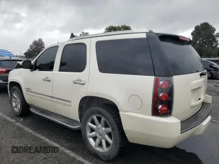 2011 GMC Yukon Denali with VIN 1GKS1EEF2BR337370, listed as a Copart auction lot 49311105 with 131,840 mi miles and Salvage Title. Bid and sale history available at carsss.com. Image 2.