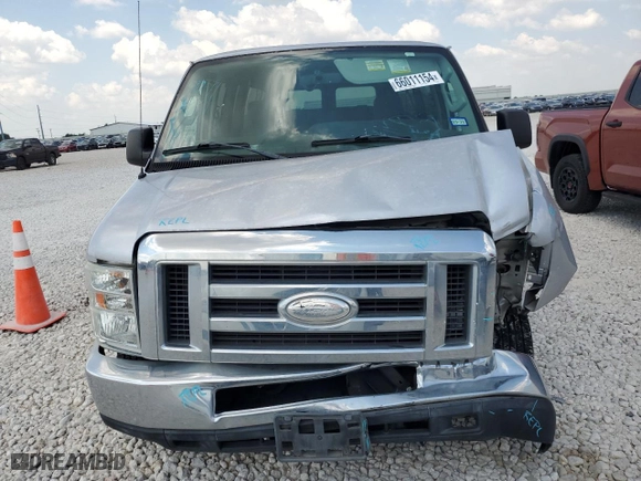 2014 Ford Econoline Wagon XL with VIN 1FBNE3BL0EDA47792, listed as a Copart auction lot 66011154 with 66,753 mi miles and Salvage Title. Bid and sale history available at carsss.com. Image 5.