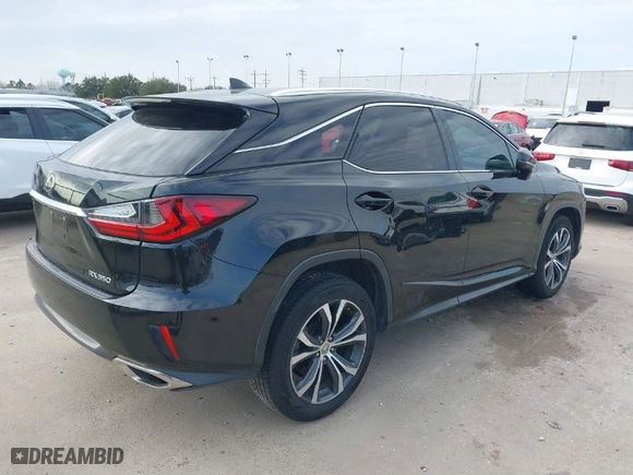 2016 Lexus RX 350 with VIN 2T2ZZMCA6GC012562, listed as a IAAI auction lot 41549952 with 135,078 mi miles. Bid and sale history available at carsss.com. Image 4.