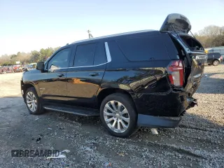 2021 Chevrolet Tahoe Premier with VIN 1GNSKSKD9MR321669, listed as a Copart auction lot 43282815 with 59,648 mi miles and Salvage title. Bid and sale history available at DreamBid. Image 2.