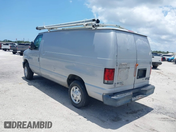 2014 Ford Econoline Cargo Commercial z VIN 1FTNE1EW6EDB05698, wystawiony jako IAAI lot #42236705 z przebiegiem 162 416 mil mil oraz . Historia ofert i sprzedaży dostępna na DreamBid. Obrazek 3.