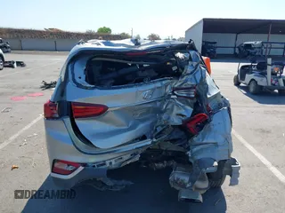 2020 Hyundai Santa Fe SE z VIN 5NMS2CAD1LH221326, wystawiony jako IAAI lot #42442177 z przebiegiem 68 995 mil mil oraz . Historia ofert i sprzedaży dostępna na DreamBid. Obrazek 17.