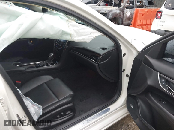 2013 Cadillac ATS z VIN 1G6AA5RX9D0156125, wystawiony jako IAAI lot #41964124 z przebiegiem 139 869 mil mil oraz . Historia ofert i sprzedaży dostępna na DreamBid. Obrazek 5.