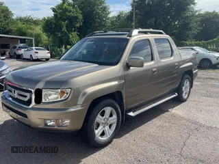 2009 Honda Ridgeline RTL with VIN 2HJYK16539H500759, listed as a Copart auction lot 63874225 with 123,508 mi miles and Clean title. Bid and sale history available at DreamBid. Image 2.