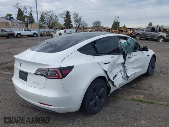 2022 Tesla Model 3 Long Range with VIN 5YJ3E1EB5NF364678, listed as a IAAI auction lot 41570361 with 17,792 mi miles. Bid and sale history available at carsss.com. Image 4.