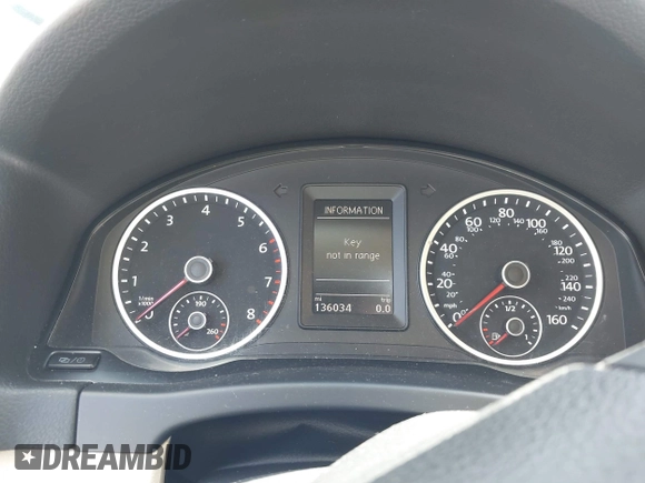2014 Volkswagen Tiguan SEL with VIN WVGAV3AX9EW512956, listed as a IAAI auction lot 42110002 with 136,034 mi miles and . Bid and sale history available at DreamBid. Image 7.
