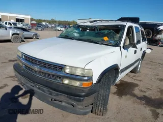 2002 Chevrolet Suburban LT with VIN 1GNFK16Z52J166390, listed as a IAAI auction lot 40688021 with 319,381 mi miles. Bid and sale history available at carsss.com. Image 2.