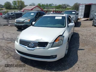 2009 Nissan Altima 2.5 S with VIN 1N4AL21E89N561120, listed as a IAAI auction lot 42020054 with 220,237 mi miles. Bid and sale history available at carsss.com. Image 6.