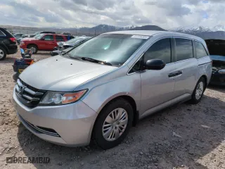 2015 Honda Odyssey LX with VIN 5FNRL5H27FB065066, listed as a Copart auction lot 51339385 with 217,849 mi miles and Clean Title. Bid and sale history available at carsss.com. Image 1.