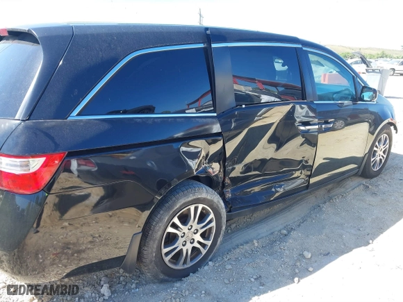 2012 Honda Odyssey EX with VIN 5FNRL5H42CB062217, listed as a IAAI auction lot 41834151 with 246,232 mi miles. Bid and sale history available at carsss.com. Image 6.