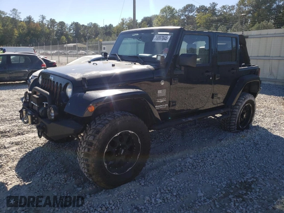 2007 Jeep Wrangler Unlimited Sahara with VIN 1J4GA59197L141821, listed as a Copart auction lot 76897044 with 124,070 mi miles and Salvage title. Bid and sale history available at DreamBid. Image 1.