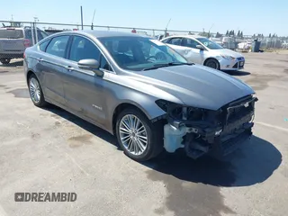 2014 Ford Fusion SE Hybrid with VIN 3FA6P0LU5ER393530, listed as a IAAI auction lot 42478440 with 93,728 mi miles and . Bid and sale history available at DreamBid. Image 1.