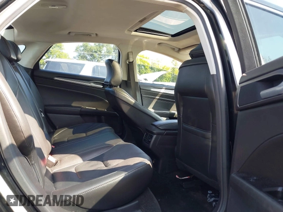 2016 Ford Fusion Titanium with VIN 3FA6P0K90GR333848, listed as a IAAI auction lot 42728138 with 147,864 mi miles and . Bid and sale history available at DreamBid. Image 8.