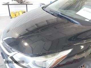 2017 Chevrolet Cruze LS z VIN 1G1BC5SM4H7270275, wystawiony jako IAAI lot #42484111 z przebiegiem 90 589 mil mil oraz . Historia ofert i sprzedaży dostępna na DreamBid. Obrazek 6.