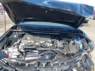 2025 Toyota Camry LE z VIN 4T1DAACK5SU581231, wystawiony jako IAAI lot #41934940 z przebiegiem 9887 mil mil oraz . Historia ofert i sprzedaży dostępna na DreamBid. Obrazek 10.