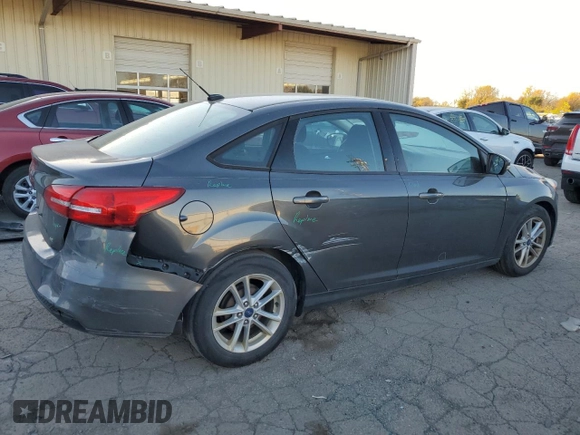 2017 Ford Focus SE z VIN 1FADP3F25HL331714, wystawiony jako Copart lot #77389764 z przebiegiem 49 953 mil mil oraz Szkoda całkowita • Salvage title. Historia ofert i sprzedaży dostępna na DreamBid. Obrazek 3.