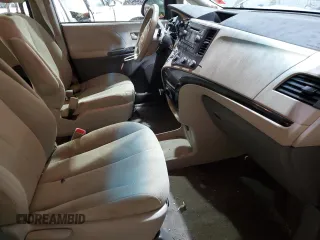 2012 Toyota Sienna with VIN 5TDKA3DC0CS010900, listed as a Copart auction lot 43432715 with 135,395 mi miles and Salvage Title. Bid and sale history available at DreamBid. Image 7.
