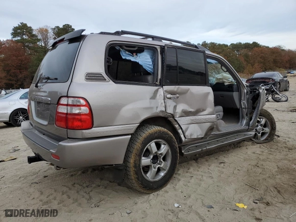 2005 Toyota Land Cruiser with VIN JTEHT05J352071860, listed as a Copart auction lot 78810494 with 219,605 mi miles and Salvage Title. Bid and sale history available at carsss.com. Image 3.