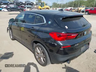 2018 BMW X2 xDrive28i z VIN WBXYJ5C37JEF71272, wystawiony jako IAAI lot #42073863 z przebiegiem 94 947 mil mil oraz . Historia ofert i sprzedaży dostępna na DreamBid. Obrazek 3.