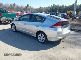 2013 Honda Insight EX z VIN JHMZE2H70DS005200, wystawiony jako IAAI lot #42105624 z przebiegiem 108 949 mil mil oraz . Historia ofert i sprzedaży dostępna na DreamBid. Obrazek 3.