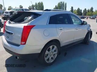 2011 Cadillac SRX Premium Collection z VIN 3GYFNFEYXBS599279, wystawiony jako IAAI lot #42372367 z przebiegiem 97 888 mil mil oraz . Historia ofert i sprzedaży dostępna na DreamBid. Obrazek 4.