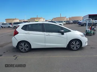 2015 Honda Fit EX-L with VIN 3HGGK5H8XFM753011, listed as a IAAI auction lot 41878734 with 121,514 mi miles and . Bid and sale history available at DreamBid. Image 13.