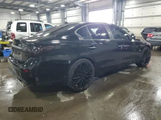 2014 Infiniti Q50 Premium with VIN JN1BV7AR1EM705764, listed as a Copart auction lot 50555595 with 105,626 mi miles and Salvage Title. Bid and sale history available at DreamBid. Image 3.
