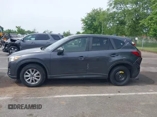 2016 Mazda CX-5 Touring z VIN JM3KE4CY4G0692655, wystawiony jako IAAI lot #42318657 z przebiegiem 212 826 mil mil oraz . Historia ofert i sprzedaży dostępna na DreamBid. Obrazek 14.
