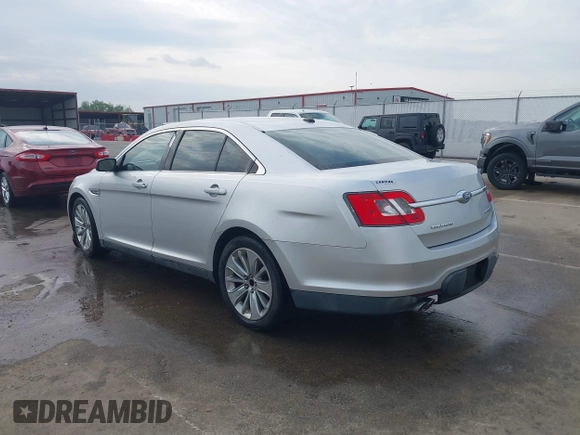 2011 Ford Taurus Limited z VIN 1FAHP2FW9BG118585, wystawiony jako IAAI lot #42124229 z przebiegiem 182 096 mil mil oraz . Historia ofert i sprzedaży dostępna na DreamBid. Obrazek 3.