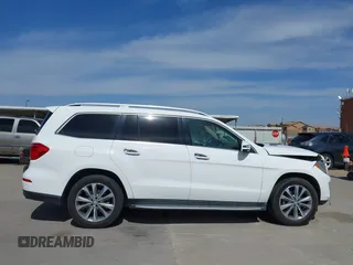2016 Mercedes-Benz GL with VIN 4JGDF6EE4GA712535, listed as a IAAI auction lot 41822698 with 143,208 mi miles. Bid and sale history available at carsss.com. Image 14.