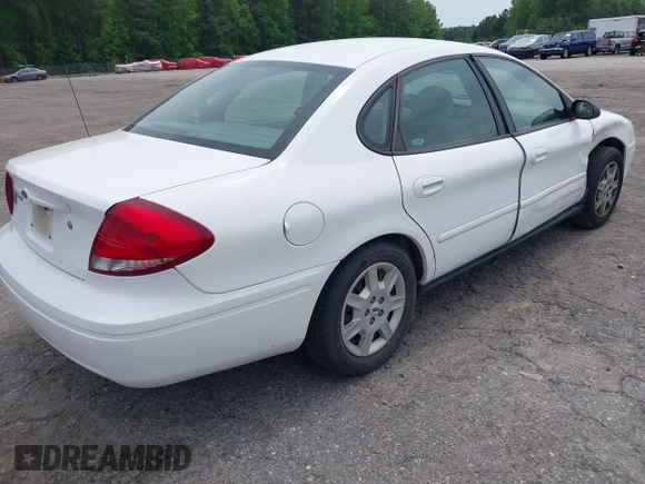 2007 Ford Taurus SE z VIN 1FAFP53U57A101188, wystawiony jako IAAI lot #42102585 z przebiegiem Nie podano mil oraz . Historia ofert i sprzedaży dostępna na DreamBid. Obrazek 4.