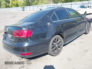 2014 Volkswagen Jetta GLI Autobahn с VIN 3VW5T7AJ3EM267647, выставлен на аукционе IAAI как лот 40507643 с пробегом 95 048 миль миль и . История ставок и продаж доступна на DreamBid. Изображение 4.