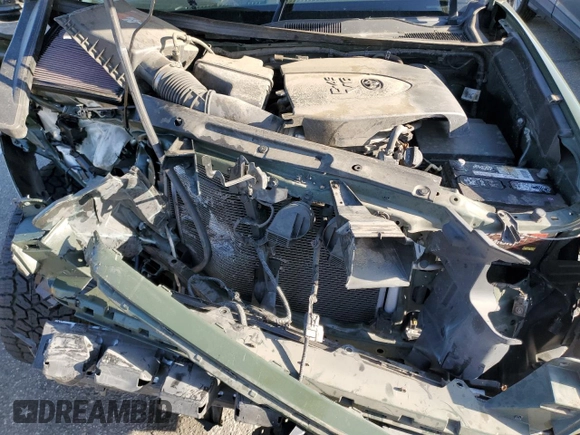 2021 Toyota Tacoma SR5 z VIN 3TMAZ5CN6MM157145, wystawiony jako Copart lot #51641085 z przebiegiem Nie podano mil oraz Szkoda całkowita • Salvage title. Historia ofert i sprzedaży dostępna na DreamBid. Obrazek 11.