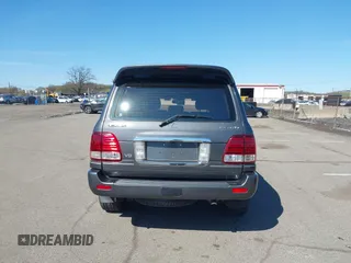 2003 Lexus LX with VIN JTJHT00W033531066, listed as a IAAI auction lot 41969617 with 209,710 mi miles. Bid and sale history available at carsss.com. Image 16.