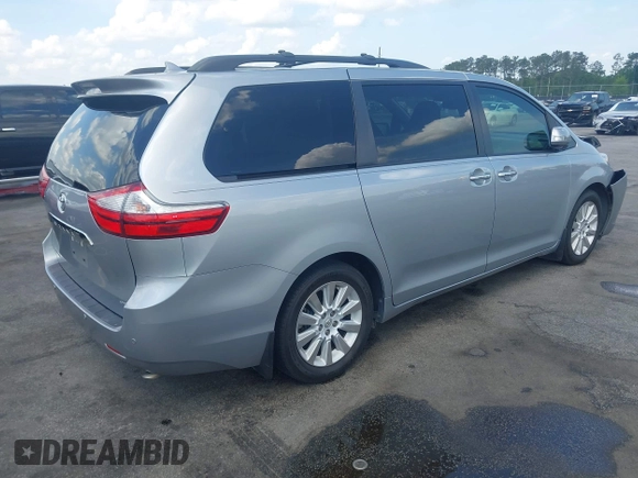 2015 Toyota Sienna XLE with VIN 5TDYK3DC5FS685735, listed as a IAAI auction lot 42139229 with 87,694 mi miles and . Bid and sale history available at DreamBid. Image 4.