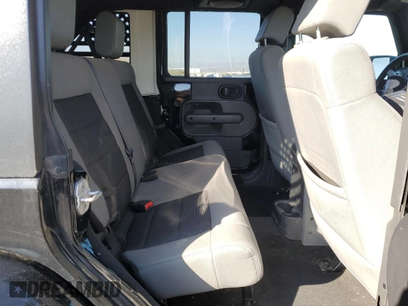 2010 Jeep Wrangler Unlimited Sahara with VIN 1J4BA5H17AL123479, listed as a Copart auction lot 49066315 with 114,419 mi miles and Salvage Title. Bid and sale history available at carsss.com. Image 11.