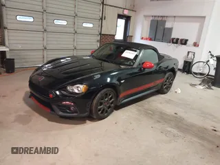 2018 FIAT 124 Spider Classica z VIN JC1NFAEK8J0133673, wystawiony jako IAAI lot #41596589 z przebiegiem 55 703 mil mil oraz . Historia ofert i sprzedaży dostępna na DreamBid. Obrazek 17.