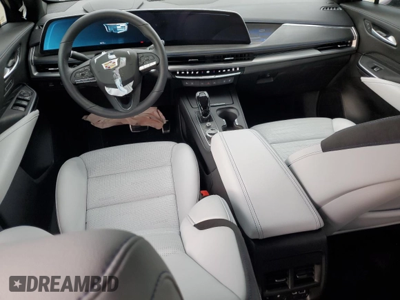 2024 Cadillac XT4 FWD Sport with VIN 1GYFZER46RF213543, listed as a Copart auction lot 83609754 with 3,878 mi miles and Salvage title. Bid and sale history available at DreamBid. Image 8.