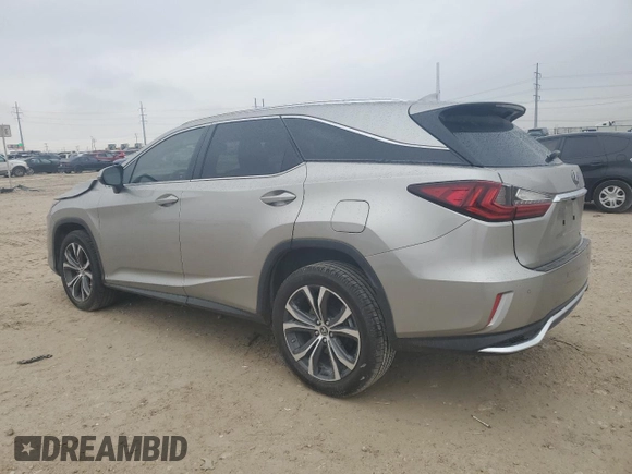 2021 Lexus RX 350L with VIN JTJHZKEA3M2022121, listed as a Copart auction lot 83263024 with 39,684 mi miles and Salvage title. Bid and sale history available at DreamBid. Image 2.