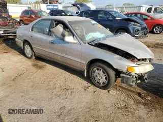 1997 Honda Accord Value with VIN 1HGCD5684VA168495, listed as a Copart auction lot 71716984 with 202,854 mi miles and Salvage Title. Bid and sale history available at DreamBid. Image 4.
