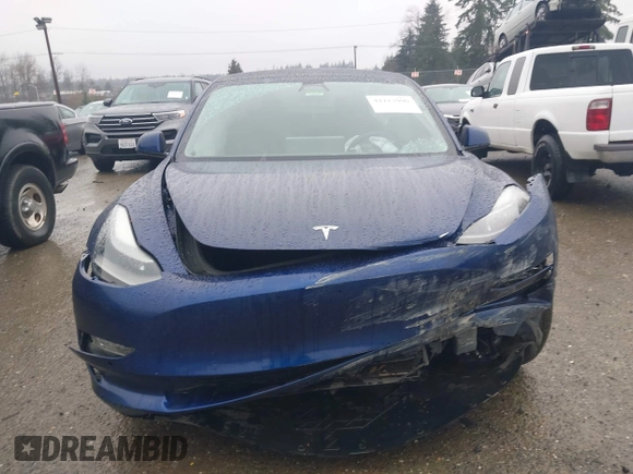 2022 Tesla Model 3 Long Range with VIN 5YJ3E1EB1NF142574, listed as a IAAI auction lot 41213900 with 127,404 mi miles and . Bid and sale history available at DreamBid. Image 12.