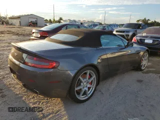 2008 Aston Martin Vantage z VIN SCFBB04B88GD08555, wystawiony jako Copart lot #73878724 z przebiegiem Nie podano mil oraz Szkoda całkowita • Salvage title. Historia ofert i sprzedaży dostępna na DreamBid. Obrazek 3.