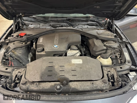 2014 BMW 4 Series 428i xDrive with VIN WBA3N5C56EF716258, listed as a Copart auction lot 52916185 with 106,512 mi miles and Salvage Title. Bid and sale history available at DreamBid. Image 7.