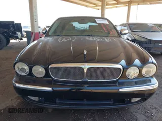 2005 Jaguar XJ Vanden Plas z VIN SAJWA82C05SG47589, wystawiony jako IAAI lot #42409697 z przebiegiem 222 598 mil mil oraz . Historia ofert i sprzedaży dostępna na DreamBid. Obrazek 12.