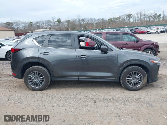 2021 Mazda CX-5 Touring with VIN JM3KFBCM8M0492145, listed as a IAAI auction lot 39077248 with 20,408 mi miles. Bid and sale history available at carsss.com. Image 13.